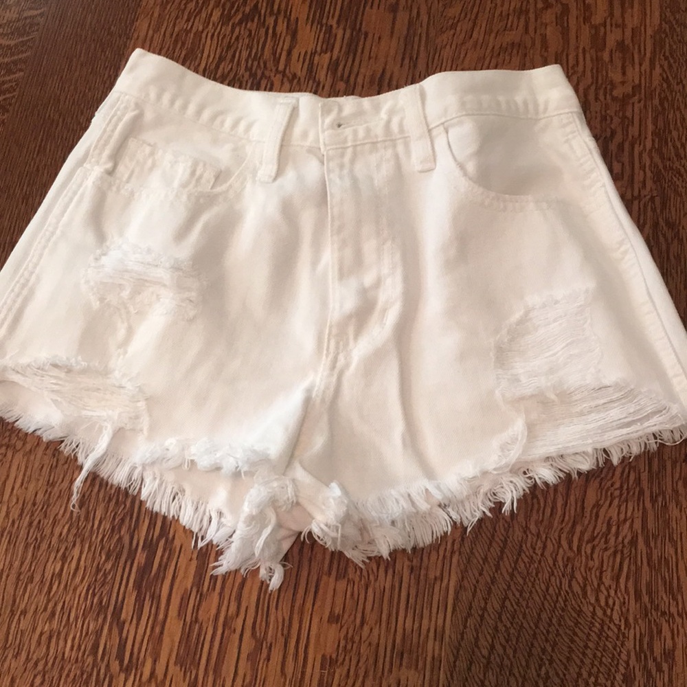 Holli Ater White high waisted denim shorts